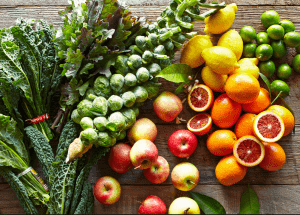 a group of fruits and vegetables on a wood surface Healthy Weight Loss Diets Kirkby in Ashfield